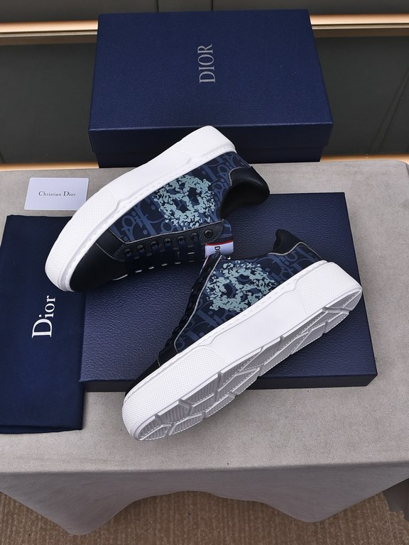 P Upgraded Dio~r   This B33 sneaker is a new take on the classic tennis shoe, with a sleek silhouette that emphasizes chunky texture. Crafted from cowhide leather with an Oblique print, they feature a padded tongue with 