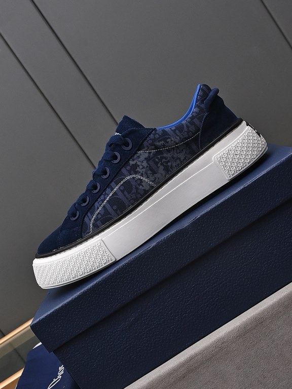 P Dio~r   A fresh take on the classic tennis shoe, the B33 sneaker is a sleek silhouette with a chunky texture. Crafted from cowhide leather with an Oblique print, they feature a padded tongue with Dior logo, wide mohair