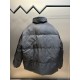 p675 PRADA Prada Reversible Down JacketPrada's iconic triangle logo is reinterpreted as a quilted pattern on this Re-Nylon stand-up jacket. The body has a modern, streetwear-inspired appeal, with an enameled metal triang