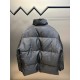 p675 PRADA Prada Reversible Down JacketPrada's iconic triangle logo is reinterpreted as a quilted pattern on this Re-Nylon stand-up jacket. The body has a modern, streetwear-inspired appeal, with an enameled metal triang