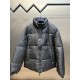 p675 PRADA Prada Reversible Down JacketPrada's iconic triangle logo is reinterpreted as a quilted pattern on this Re-Nylon stand-up jacket. The body has a modern, streetwear-inspired appeal, with an enameled metal triang