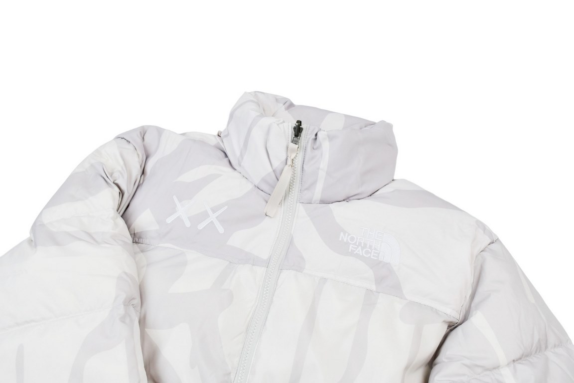 378 Top Version The North Face x Kaws Co-Branded 1996 US Down JacketThe three compartments are filled with RDS certified high quality 700 high fluffy duck down for better warmth, lightweight but not heavy, and the fluffi