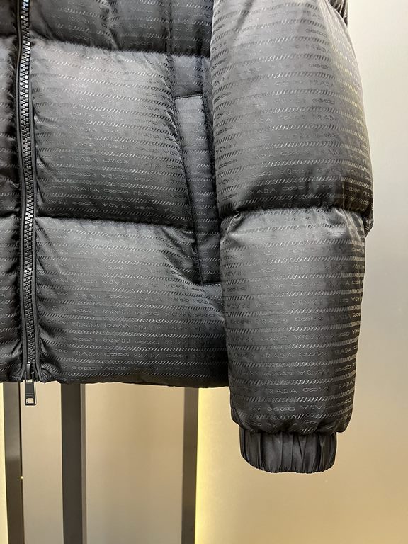 900prada prada new jacquard nylon down jacket metal small label down jacket. The down jacket is made from re-nylon recycled nylon in a modern design that complements the silhouette and features 95% white duck down for wa