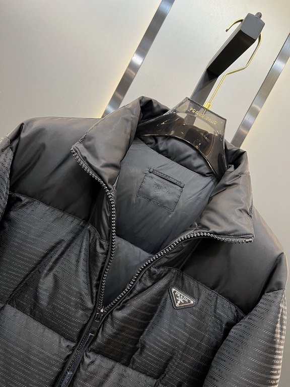 900prada prada new jacquard nylon down jacket metal small label down jacket. The down jacket is made from re-nylon recycled nylon in a modern design that complements the silhouette and features 95% white duck down for wa