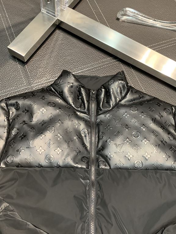 The P940 Down Jacket - LV Louis Vuitton Exclusive Standing Collar Down Jacket. Patchwork leather design, fashionable luxury details highlight the distinctive qualities, deconstructive tailoring treatment has achieved its