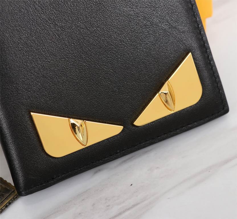 Brand FENDIStyle Gold clipItem No. 968568Color black golden ironSize 129.52Material large surface with imported first layer of Napa cowhide, lining with black sheepskin, feel delicateFENDI short clip wallet Introduction 