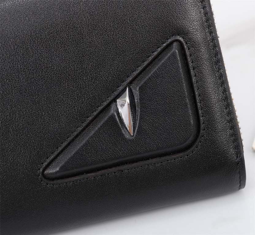 Brand FENDIModel Black Eye Single PullItem No. 868568Color blackSize 19.510.53Material Imported head layer nappa cowhide for the big side, black sheepskin for the lining, delicate feelFENDI zipper wallet Introduction the