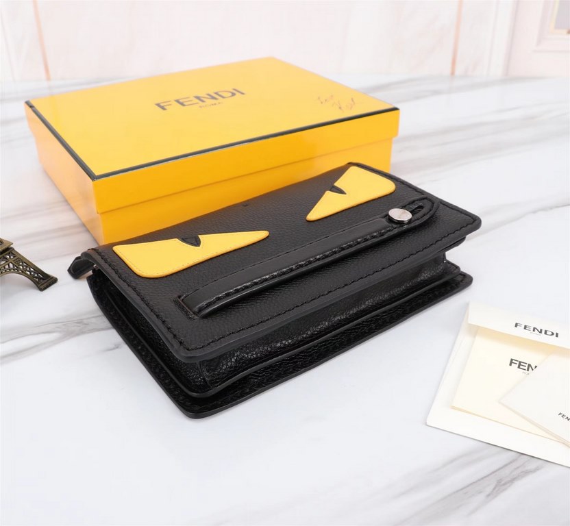 Brand FENDI FendiModel No. Yellow Sticker Clutch Bag for MenItem No. 768568Color black   egg yolkMaterial first layer imported Lychee grain cowhideSize 23155F family fendi clutch bag in calf leather with metal BAG BUGS e