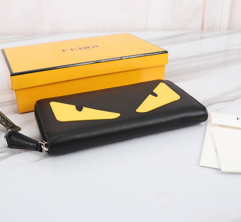 Brand FENDIStyle Single pull with yellow stickerItem No. 868568Color black   lemon yellowSize 19.510.53Material imported head layer Napa cowhide, red sheepskin lining, delicate feelFENDI zipper wallet Introduction spring