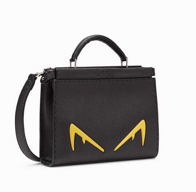 Briefcase family and add new members, this time is the use of lychee grain calf leather as raw materials and is handmade   stitching Oh decorated with yellow   Devil's eyes so that the bag does not look so dull Middle a 