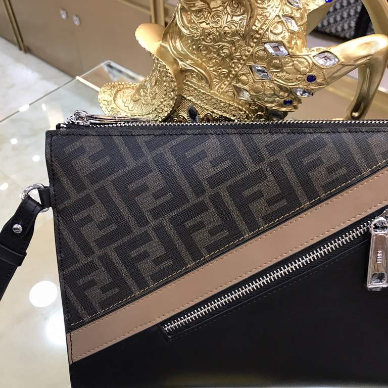 FENDI Fendi F-Home new clutch bag with detachable chain carry handle, internal card holder, front with zipped diagonal pocket with zipper closure, in curry textured fabric material with FF pattern. Finished with black le