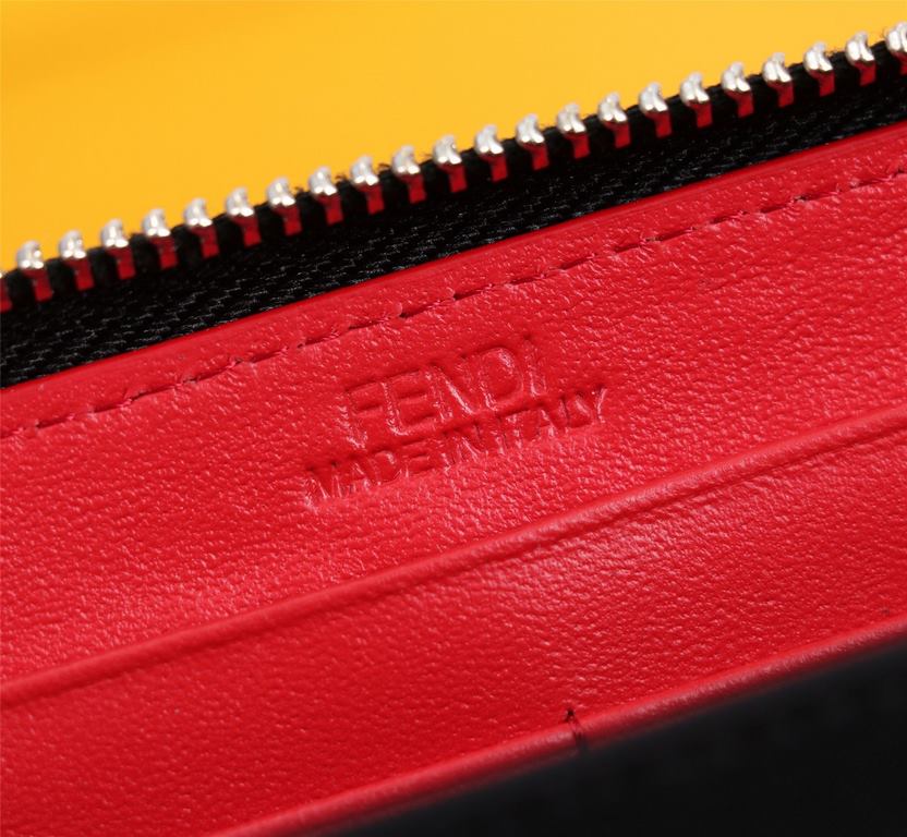 Brand FENDIStyle Single pull with yellow stickerItem No. 868568Color black   lemon yellowSize 19.510.53Material imported head layer Napa cowhide, red sheepskin lining, delicate feelFENDI zipper wallet Introduction spring