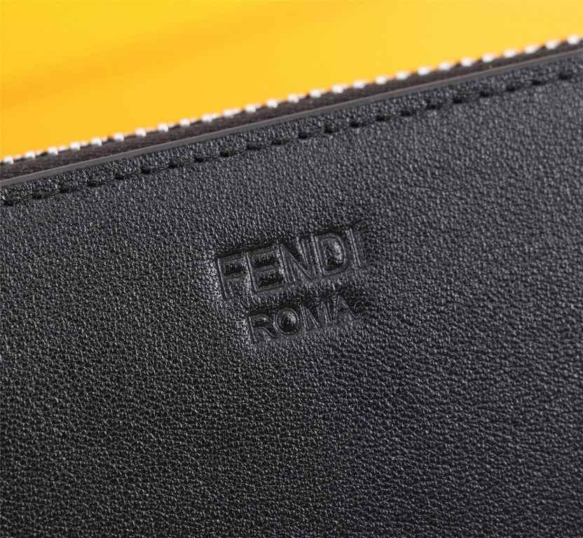 Brand FENDIModel White Iron Single PullItem No. 868568Color black silverSize 19.510.53Material imported head layer nappa cowhide, black sheepskin lining, delicate feelFENDI zipper wallet Introduction spring and summer of