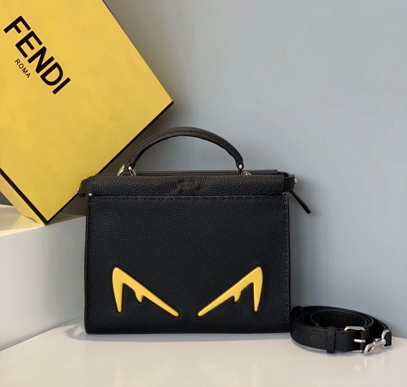 Briefcase family and add new members, this time is the use of lychee grain calf leather as raw materials and is handmade   stitching Oh decorated with yellow   Devil's eyes so that the bag does not look so dull Middle a 