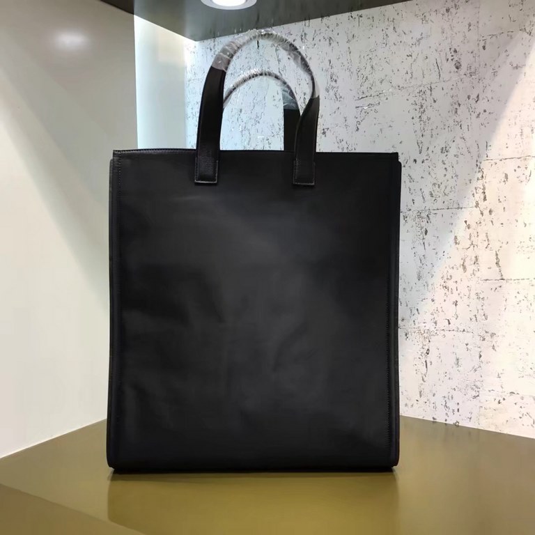 F family high quality nylon shopping bag, front lined with calfskin leather trim, decorated with eye shape decorations and bottom metal zipper pocket design, interior with small pockets, double hand carry 35cm.