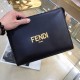 Fendi Fendi Original New Clutch Sharply designed zipper clutch. Made of black Romano leather. Contrasting Fendi lettering patch printed on the bottom side of the Romano leather. Palladium-finish metalwork.Size 27-20-6Mod