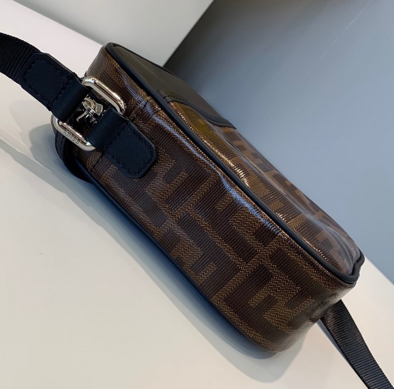 F Family Oval crossbody bag with F embossed in brown waterproof material and top zipper opening.13.5.18cm