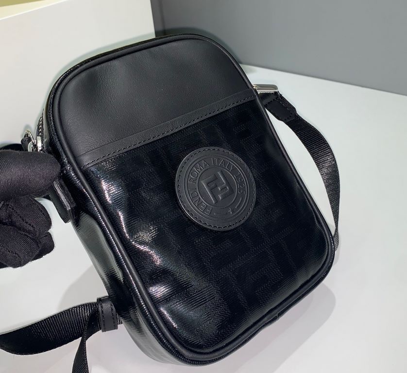 F Family Oval crossbody bag, black waterproof material embossed with F, top zipper opening design.13.5.18cm