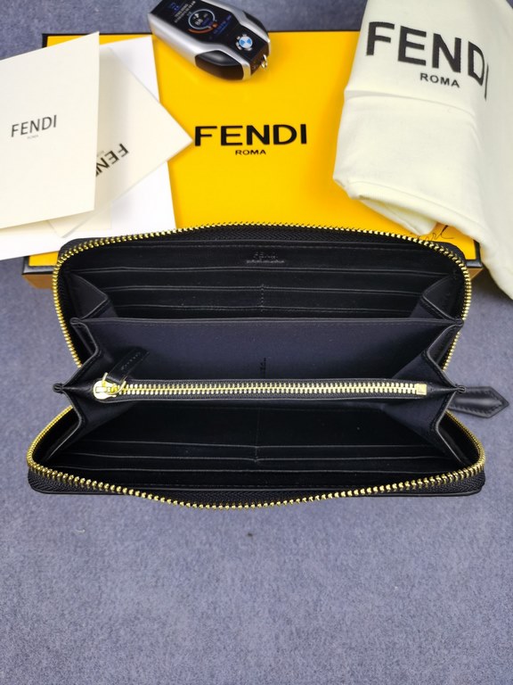 Brand FENDI FendiModel No. BonesItem No. 868568Color blackSize 19.510.53Material Imported head layer nappa cowhide for the big side, black sheepskin for the lining, exquisite hand feeling.FENDI zipper wallet Introduction