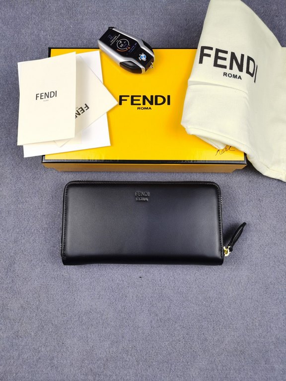 Brand FENDI FendiModel No. BonesItem No. 868568Color blackSize 19.510.53Material Imported head layer nappa cowhide for the big side, black sheepskin for the lining, exquisite hand feeling.FENDI zipper wallet Introduction