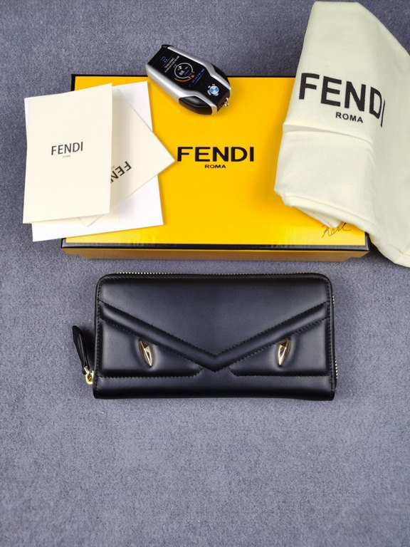 Brand FENDI FendiModel No. BonesItem No. 868568Color blackSize 19.510.53Material Imported head layer nappa cowhide for the big side, black sheepskin for the lining, exquisite hand feeling.FENDI zipper wallet Introduction