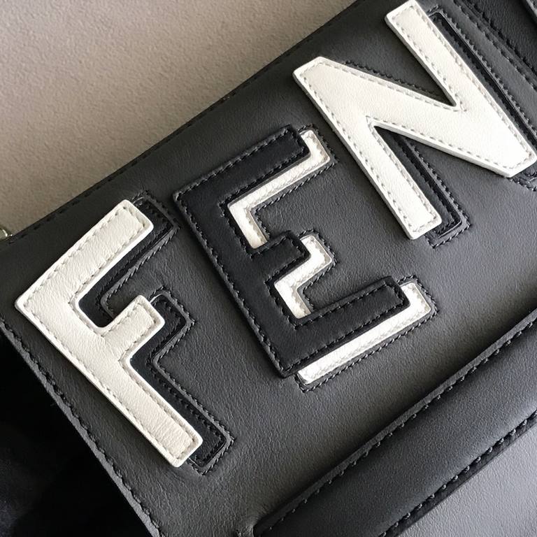 Thin clutch bag with zipper closure, 3 internal compartments with 8 credit card slots, 1 spacious crotch-access bill compartment, 1 organizer and zipper pocket, made of calfskin leather, inlaid with the letter F in black