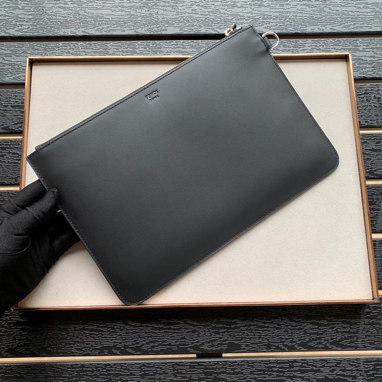 F family clutch bag in thin calfskin leather, embossed with a color-printed eye shape, zipper closure and engraved with the F logo on the back. 30.20cm