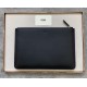 Thin black calf leather clutch bag with embossed multicolored inlays and metal details in the shape of BAG BUGS eyes 30cm