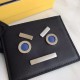 Calfskin three-layer card holder with metal appliqué inspired by the speechless emoji, slim and compact, easy to carry.