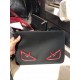 F Clutch bag in thin calf leather in black, embossed with a color-printed eye shape, zipper closure and engraved with the F logo on the back.30.20cm