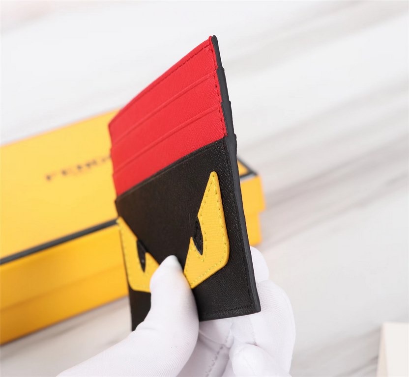 Brand FENDIStyle Cross Stripe Black, Red and Yellow Sticker Card CaseItem No. 2020568Color black   orange redMaterial imported cross grain cowhide leatherSize 10.59FENDI short clip card bag Introduction the latest spring