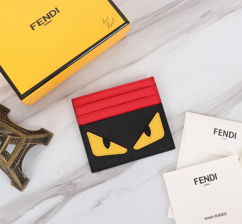 Brand FENDIStyle Cross Stripe Black, Red and Yellow Sticker Card CaseItem No. 2020568Color black   orange redMaterial imported cross grain cowhide leatherSize 10.59FENDI short clip card bag Introduction the latest spring