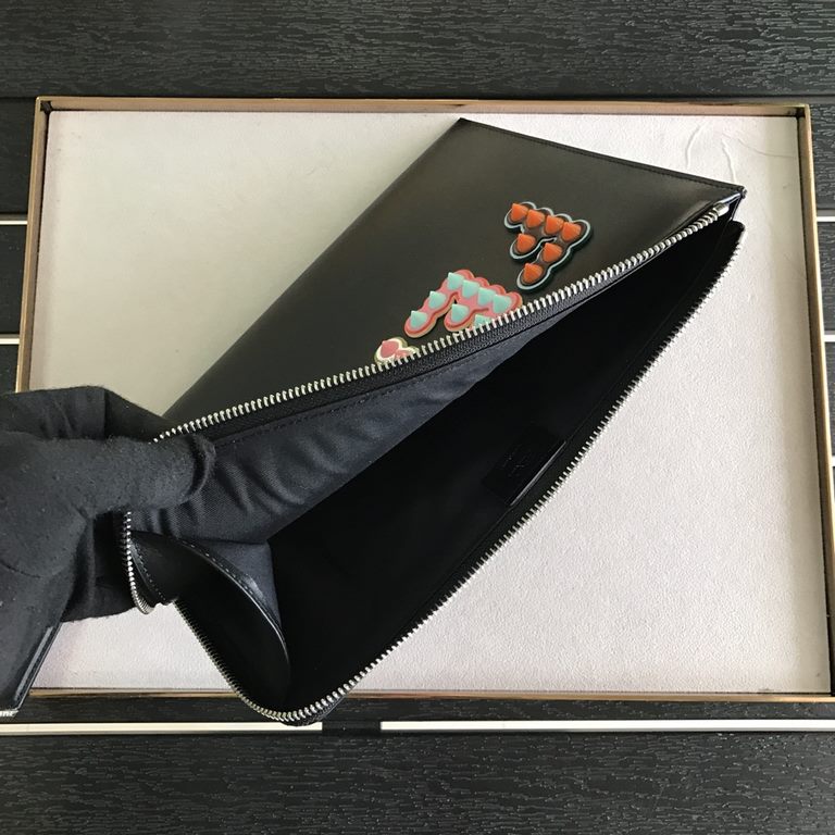 F Family Black Calfskin clutch bag with F-shaped decorative detailing consisting of studs in the center and a top zipper 26cm.