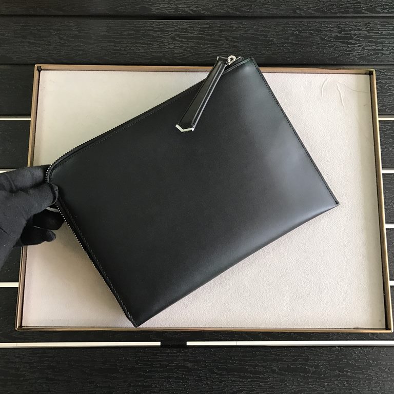 F Family Black Calfskin clutch bag with F-shaped decorative detailing consisting of studs in the center and a top zipper 26cm.