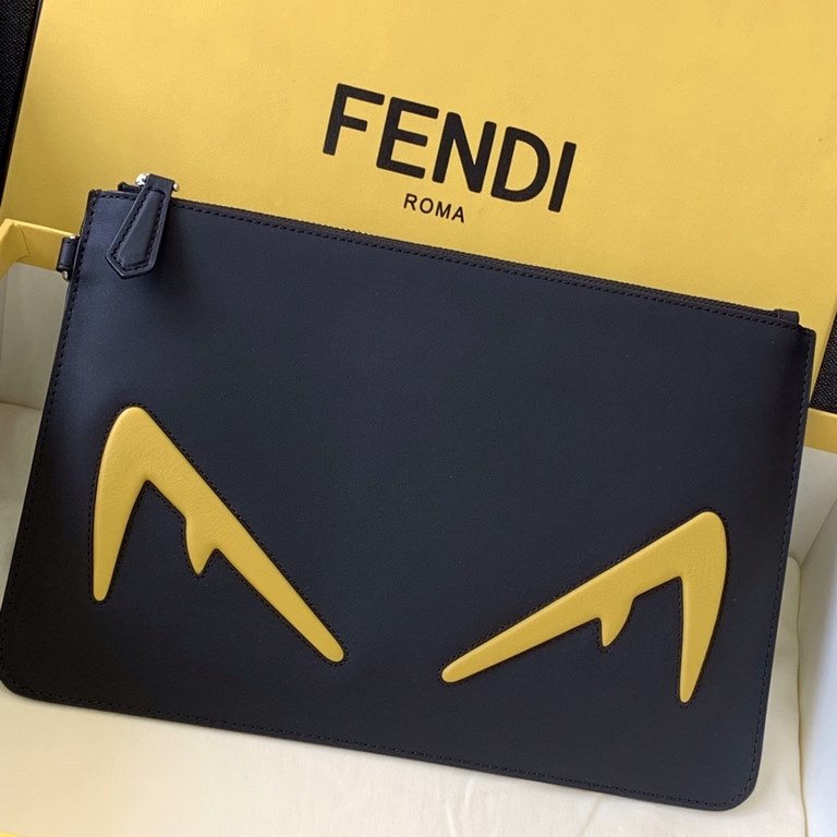 2019 new handbag fashion   practical   affordable, slim zipper design unisex capacity, calf leather customized, decorated with yellow convex embossed devil  ♀ eyes, 30cm