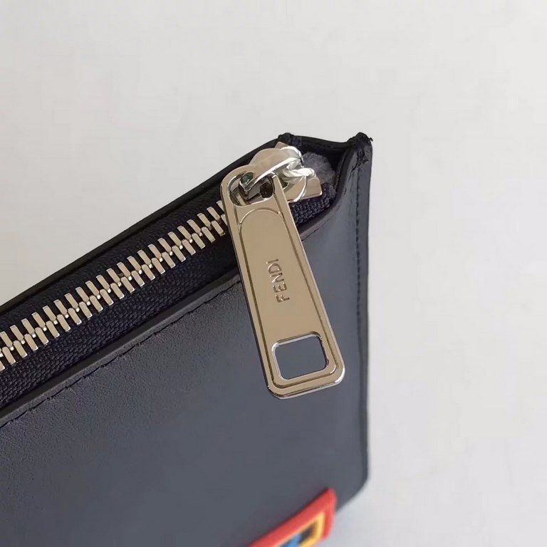 Thin clutch bag in navy blue calf leather. The back features THINK and FEN lettering with appliqués and multicolored rubber details inspired by the FEN VOCABULARY theme. Zipper closure and palladium-finish metal hardware