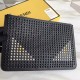 Studded Black fine calf leather zipper handbag with black, silver and yellow studs all over the front to create the BAG BUGS eye pattern. 28cm.