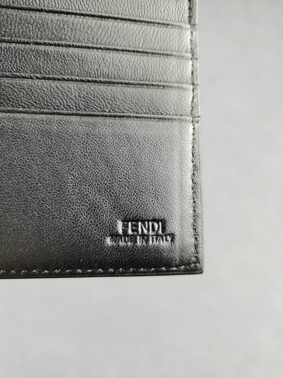 Brand FENDIStyle Eagle Eye ClipItem No. 968568Color blackSize 129.52Material large surface with imported first layer of Napa cowhide, lined with black sheepskin, delicate feelFENDI short clip wallet Introduction 20 years