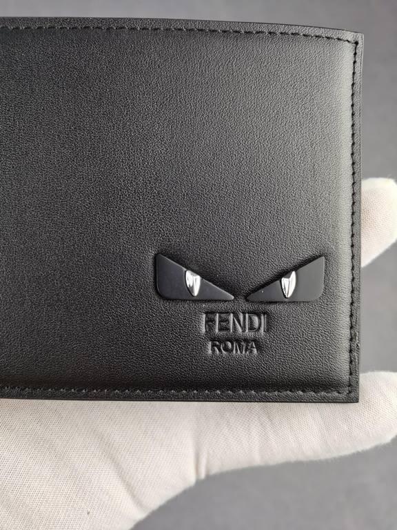 Brand FENDIStyle Eagle Eye ClipItem No. 968568Color blackSize 129.52Material large surface with imported first layer of Napa cowhide, lined with black sheepskin, delicate feelFENDI short clip wallet Introduction 20 years