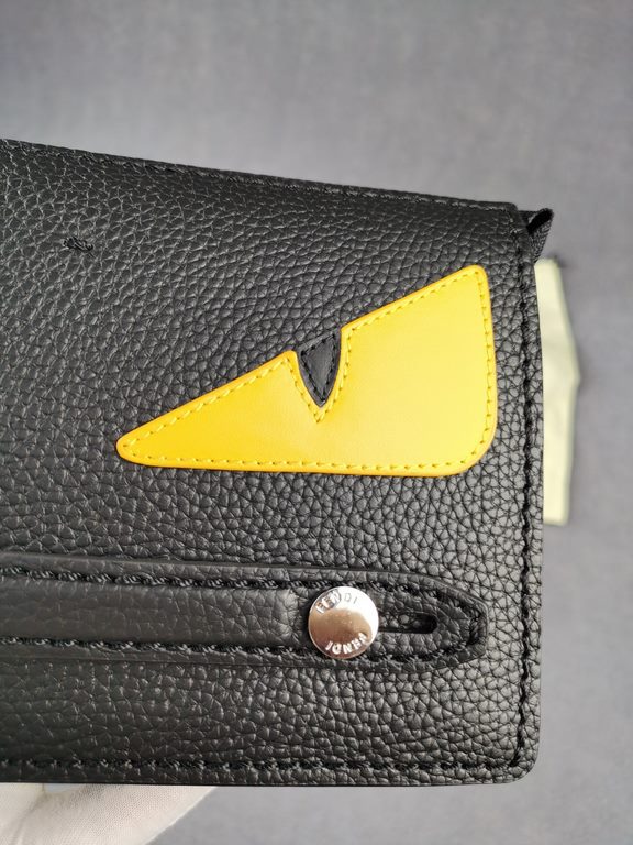 Brand FENDI FendiModel No. Yellow Sticker Clutch Bag for MenItem No. 768568Color black   egg yolkMaterial first layer imported Lychee grain cowhideSize 23155F family fendi clutch bag in calf leather with metal BAG BUGS e