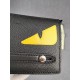 Brand FENDI FendiModel No. Yellow Sticker Clutch Bag for MenItem No. 768568Color black   egg yolkMaterial first layer imported Lychee grain cowhideSize 23155F family fendi clutch bag in calf leather with metal BAG BUGS e