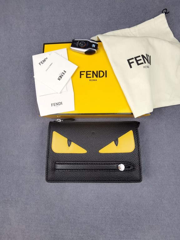 Brand FENDI FendiModel No. Yellow Sticker Clutch Bag for MenItem No. 768568Color black   egg yolkMaterial first layer imported Lychee grain cowhideSize 23155F family fendi clutch bag in calf leather with metal BAG BUGS e