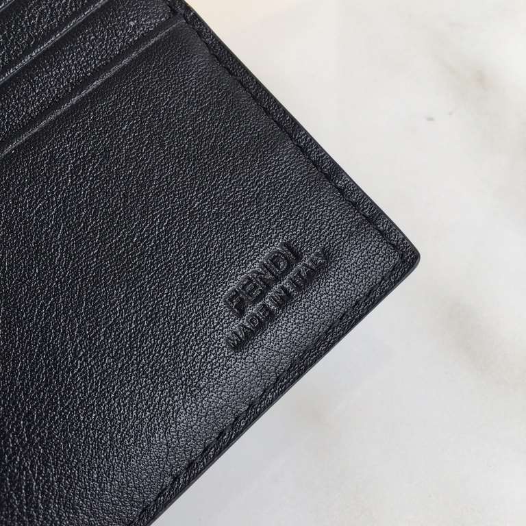 Black Plain Leather Horizontal wallet decorated with metal eyes with eight card slots and two billfold pockets.