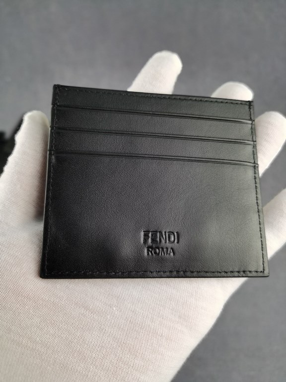 Brand FENDIStyle Card CaseItem No. 2020568Color Black White IronMaterial imported nappa leatherSize 10.59FENDI short clip card bag Introduction 20 years of spring and summer of the latest handbag, using the first layer o