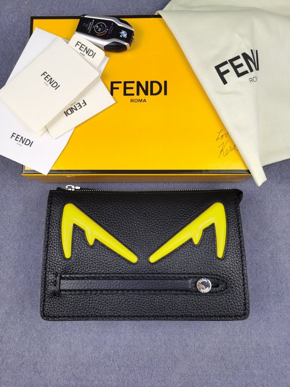 Brand FENDI FendiModel No. Yellow F Clutch Bag for MenItem No. 768568Color black   egg yolkMaterial first layer imported litchi grain cowhide leatherSize 23155F family Fendi clutch bag in calf leather with metallic BAG B