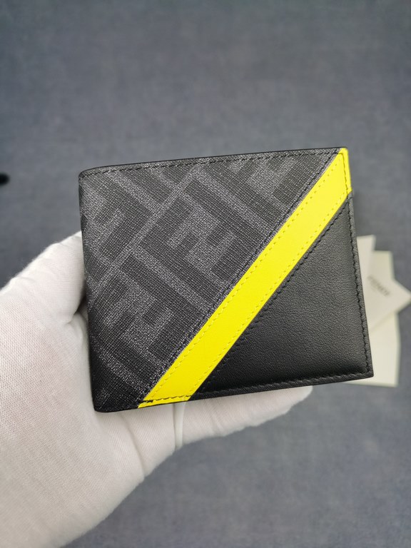 Brand FENDIStyle PVC yellow clipItem No. 968568Color GreySize 129.52Material Imported head layer Napa cowhide   double letters PVC, black sheepskin lining, delicate feelFENDI short clip wallet Introduction 20 years of sp