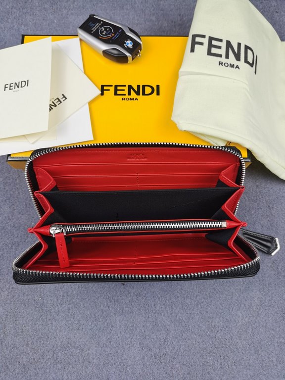 Brand FENDIStyle Single pull with yellow stickerItem No. 868568Color black   lemon yellowSize 19.510.53Material imported head layer Napa cowhide, red sheepskin lining, delicate feelFENDI zipper wallet Introduction spring