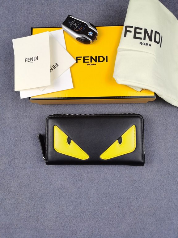 Brand FENDIStyle Single pull with yellow stickerItem No. 868568Color black   lemon yellowSize 19.510.53Material imported head layer Napa cowhide, red sheepskin lining, delicate feelFENDI zipper wallet Introduction spring