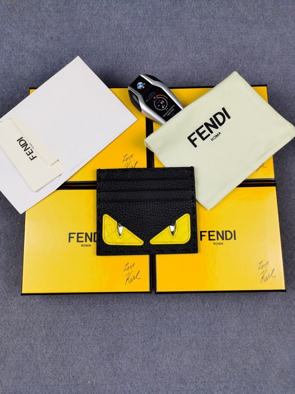 Brand FENDIStyle Stitched Yellow Sticker Card CaseItem No. 2020568Color black   stone pattern yellowMaterial first layer imported Lychee grain cowhide leatherSize 10.59FENDI short clip card bag Introduction 20 years of s