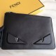 Thin black calf leather clutch bag with embossed multicolored inlays and metal details in the shape of BAG BUGS eyes, zipper closure and engraved logo on the back. 30cm.